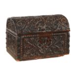 A rare Charles II oak casket or box, the lid and sides carved with flowers, including a tulip to the