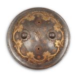 Indian arms and armour. A brass overlaid steel and koftgari shield, dhal, 19th c, the reverse with