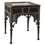 An Ottoman ebony, teak, bone and mother-of-pearl bijouterie table, c1880, with bevelled glass