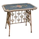 An Art Nouveau cast iron table base, early 20th c and a later mosaic top, 74cm h; 83 x 52cm .Base