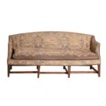A mahogany sofa, upholstered in close nailed floral needlepoint, 19th c,  with cushion, 186cm