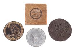 Three military medallions.