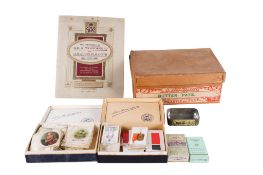 A collection of assorted vintage cigarette trading cards, mostly military interest.