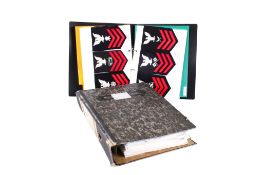 A collection of WWII and later US American navy and army cloth badges.