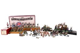 A collection of modern die cast soldier figurine groups. Some mounted as diorama raised on plinths.