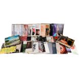 A box of assorted vintage vinyl LP records mostly 1950s and 60s.