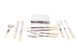 A hallmarked silver cigarette box and a group of mother of pearl handled cutlery.