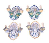 Two pairs of faience Portuguese ceramic wall sconces.