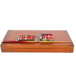 An early 20th century fold-out mahogany bagatelle bar billiards table, balls and a cue.