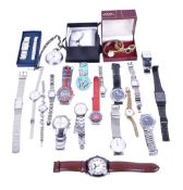 A collection of assorted fashion ladies' and gentlemen's wristwatches.