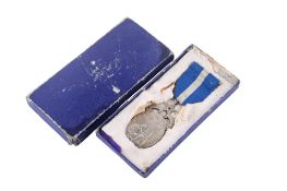 A George VI boxed silver Masonic medal.