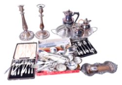 An assortment of silverplated table items.