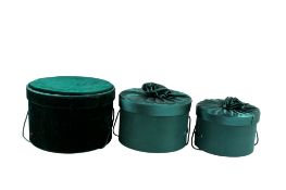 A set of three graduated boxes.