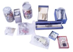 A large assortment of costume jewellery and wristwatches.