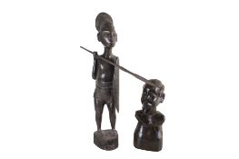 Two Angolian wooden tribal figures.