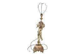 A mid-century gilt metal table lamp.