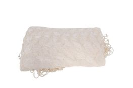 A vintage cream shawl.