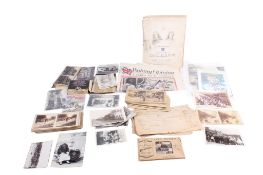 An assortment of historical paperwork and collectables.