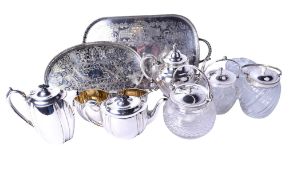 An assortment of silverplate and cut glass.