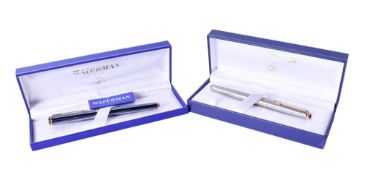 Two boxed Waterman fountain pens.