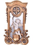A reproduction Rococo style wall mirror.