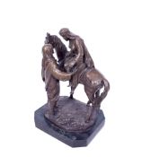 A 20th century bronze figural group.