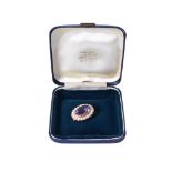 A 9ct gold and amethyst brooch.