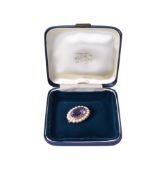 A 9ct gold and amethyst brooch.