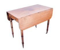 A mahogany Pembroke table.