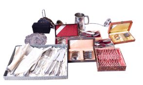 An assortment of silverplated table items.