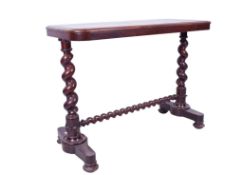 A mahogany side table.