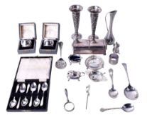 A small group of silver and white metal.