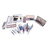 A collection of Parker pens.