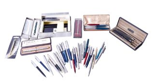 A collection of Parker pens.