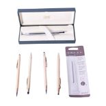 A collection of Cross pens and accessories.