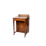 A 19th century inlaid rosewood Davenport.