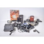 An assortment of Olympus OM camera accessories. To include two 50mm f1.