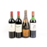 Three bottles of assorted red wine and a bottle of 1980 Veuve Clicquot Ponsardin.