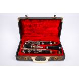 A Boosey & Hawkes Regent clarinet, cased. S/n 269862, with spare mouth piece.