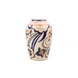A Poole Pottery vase painted by N. Massarella. Decorated with blue, pink and peach floral patterns.