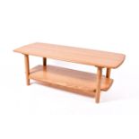 Ercol Windsor coffee table. Having under tier with turned supports.