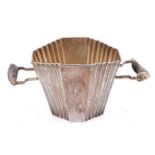 An Art Deco fan shaped silver plated ice bucket with antler handles.