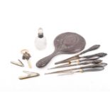 A small group of silver and white metal.