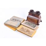 A Victorian stereoscopic '3D' card viewer and a quantity of cards. (AF).