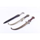 Two Moroccan Koummya style daggers with jabiya curved blade plus another. Largest total 42cm long.