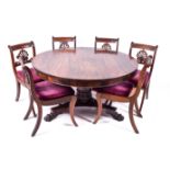 A 19th century rosewood tilt top breakfast table and a set of six chairs.