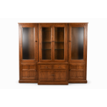Ercol Golden Dawn ash modular three-piece breakfront bookcase.