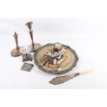 Quantity of assorted vintage silver plated items. Including a bread board and candlesticks, etc.