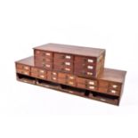 Early 20th Century oak desk-top bank of nine drawers and one other twelve drawer banks of drawers