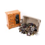 A collection of assorted costume jewellery and a glazed wood jewellery box.